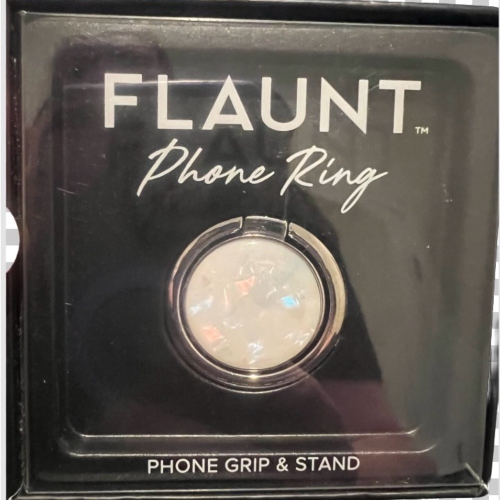 Shiny white flaunt phone ring. Unopened.